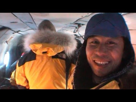 Helicopter towards to the departure point - Geographic North Pole 2002 expedition