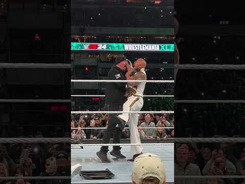 Undertaker chokeslams The Rock