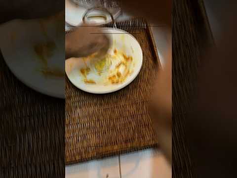 Reversed video of meal, Asian loves andachola in gravy #reversevideo #food blogger  #foodie #oman