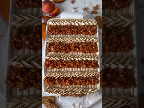 A MUST MAKE! The best peach Biscoff sheet cake! Recipe on bakingwithblondie.com #cake #peaches