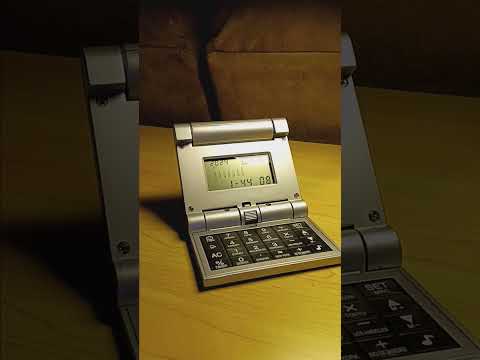 Robotic calculator, world clock, alarm,calendar , calculator from 2000.