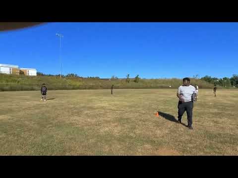 FAMU HIGH'S Coach Sylvester Peck, Jr. teaching the four corner drill.