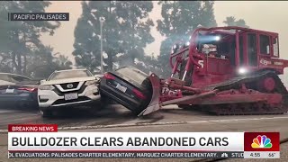 Watch: Bulldozer clears abandoned cars near Pacific Palisades wildfire