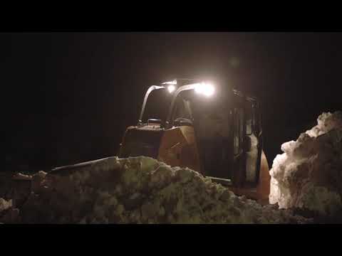 Extreme Mountains of Snow Calls for Epic Bull Dozer Action - Massive Snow Dump