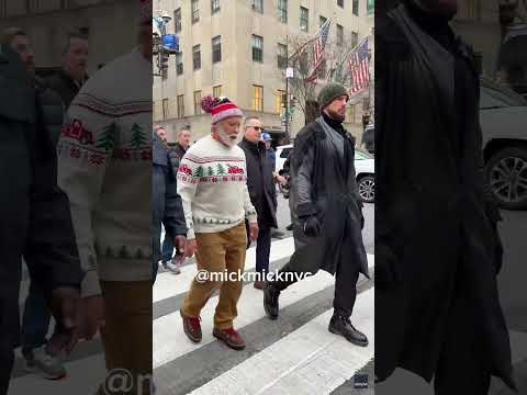 Arnold Schwarzenegger spotted doing his best jolly Santa impression