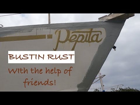 RUST BUSTERS: Toe rail rust removal.  Sealing DECK TO HULL JOIN. Using Petit Splash Zone/ Rust Lok