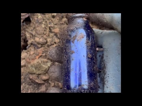 Digging up Antique Bottles at an old Trash Dump