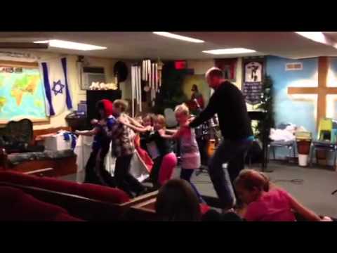 Judd and kids dancing