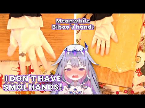 Biboo denies that she has SMOL hands, also her:  [HololiveEN]