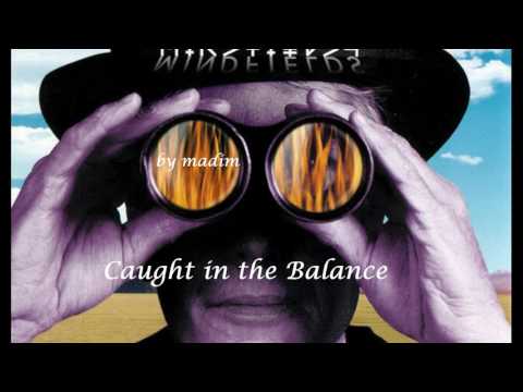 ToTo - Caught in the Balance (lyrics)