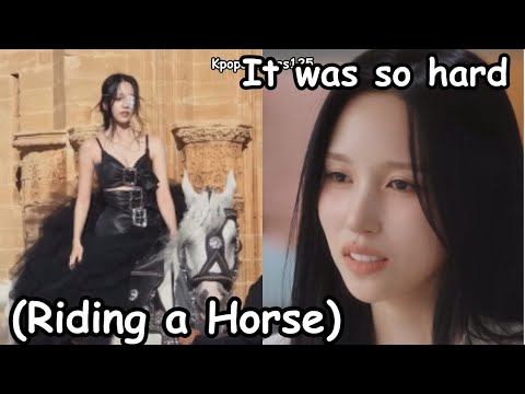 twice mina struggling to ride a horse while shottong the Identity M/V *Misamo documentary*