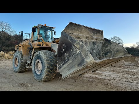 Pallet tine problems. Digging out for last of the concrete- bull fertility test.