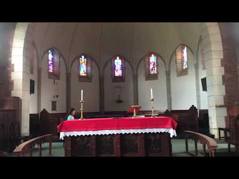 Playing piano in the chapel of Michaelshouse