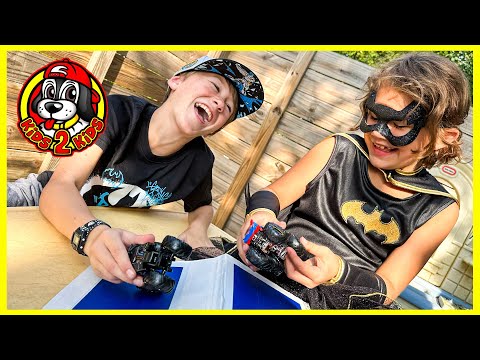 KIDS2KIDS BATMAN PARTY SURPRISE! New Toy Unboxing & Play - Monster Trucks, Batmobile Racing & More!