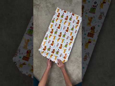 Gift Wrapping a 14” Squishmallow! Watch to see how to make this squishy gift look adorable!