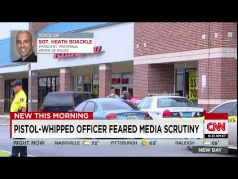 CNN News August 16 2015 Pistol whipped cop  I hesitated to shoot