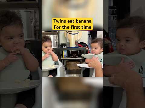 ￼Twins eat for the first time. Babies taste test