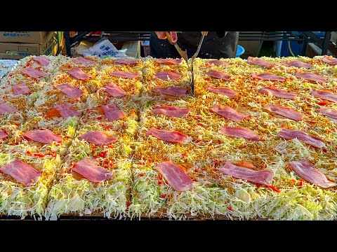 japanese street food - savory pancake okonomiyaki  お好み焼き