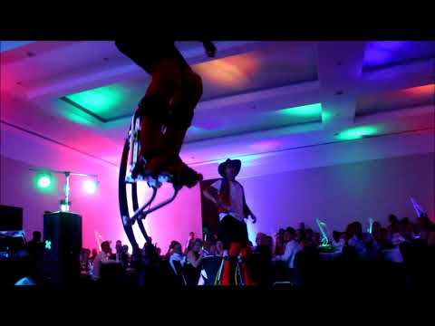 Acrobatic duo on bouncy stilts