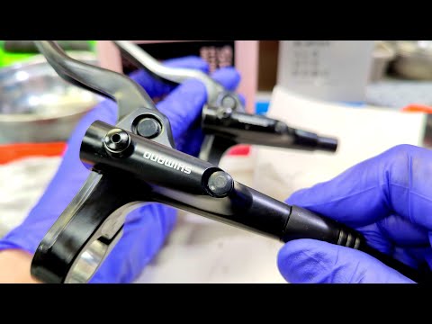 Leaking hydraulic brake on a bicycle. Replacing a Shimano MT-201 brake