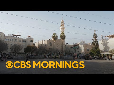 Empty streets and closed shops mark a somber Christmas Eve in Bethlehem