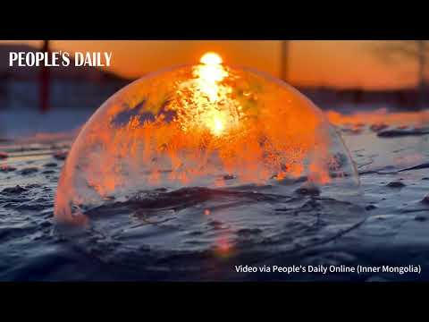 Let the chill of -30°C and the beauty of a frozen bubble fill you with joy.