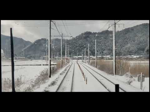 Sasayamaguchi to Sanda Jr line train in Japan during snowing