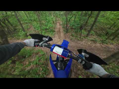 Burning in new trail on a YZ250X