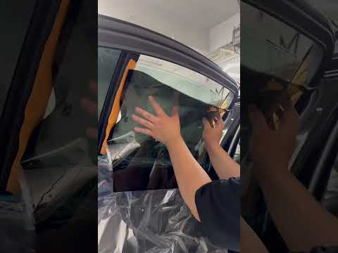 Installing 5% nano ceramic film on rear door windows using the 2 stage installation method!