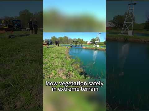 Tall grass, thick grass, steep slopes by the pond - no problem! RC mower got this under control!