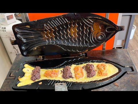 korean street food - giant fish shaped bread 초대형 대왕 붕어빵