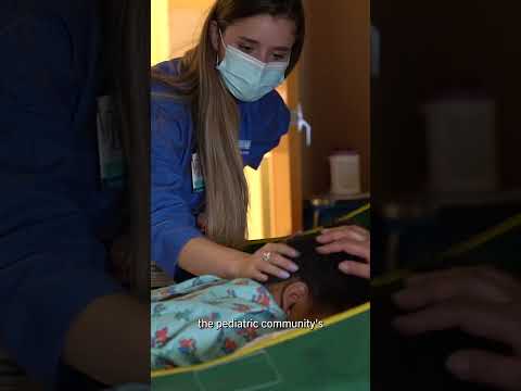 UCLA student reads to pediatric patients outside of class