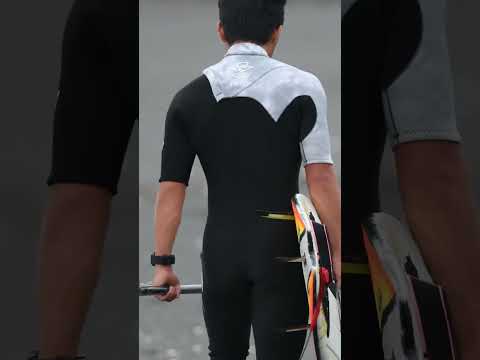 A beautiful girl doing stand-up paddleboarding