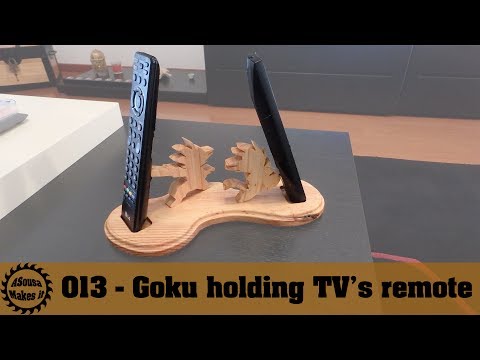 Goku holding TV's remote