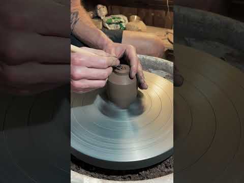 Crafting Elegance: Trimming a Dark Stoneware Yunomi Cup. Pottery tutorial video, Ceramics studio