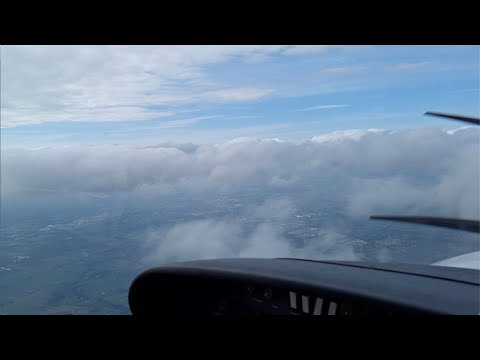 Aviation #101: Descending through the clouds in a Diamond Star.