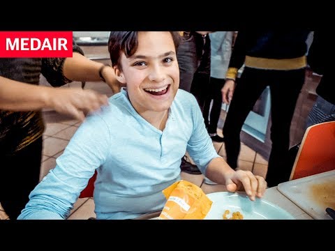 Kids learn to cook Afghanistan’s national dish