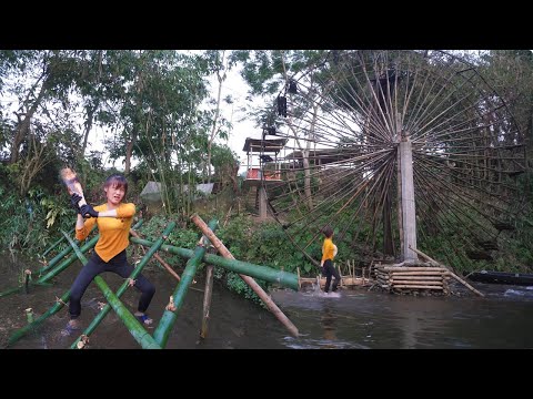 Repair and restoration of old water wheels - Make a trash fence to protect the water wheel