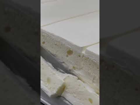 A pure white cubed whipped cream cake like you've never seen before!