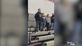 Dad from military family steps up to sing national anthem when recording fails