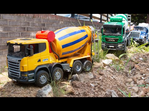 Let's drive and move our different looking ready mixed concrete cars