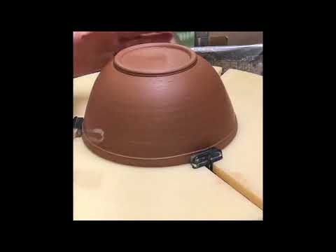 Texturing a trimmed pottery bowl