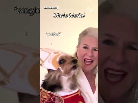 Woman and Her Rescue Dog Sing Christmas Carols For Neighbors