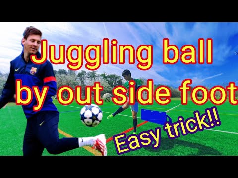 Juggling the ball by oit side foot