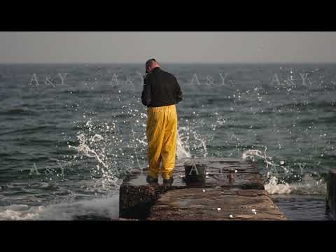 Fishing on the sea breakwater. Sea fishing.