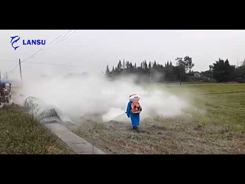 Garden fruit tree farmland dusting with back spray