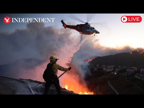 Aerial view of California wildfires as blaze continues to rage