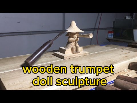 wooden trumpet doll sculpture