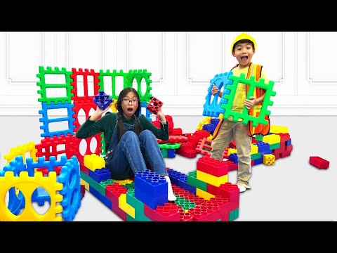 Wendy and Eric Pretend Play with Toy Blocks