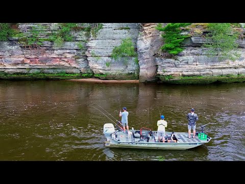 Suprise MONSTER Lives Under These GIANT CLIFFS!! (River Fishing)